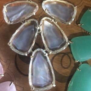 Kendra Scott gold Harlow statement necklace in floating mother of Pearl